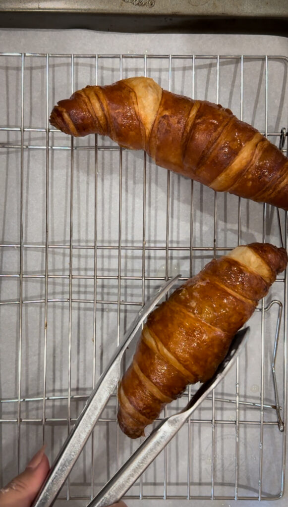 fried croissants on wire rack