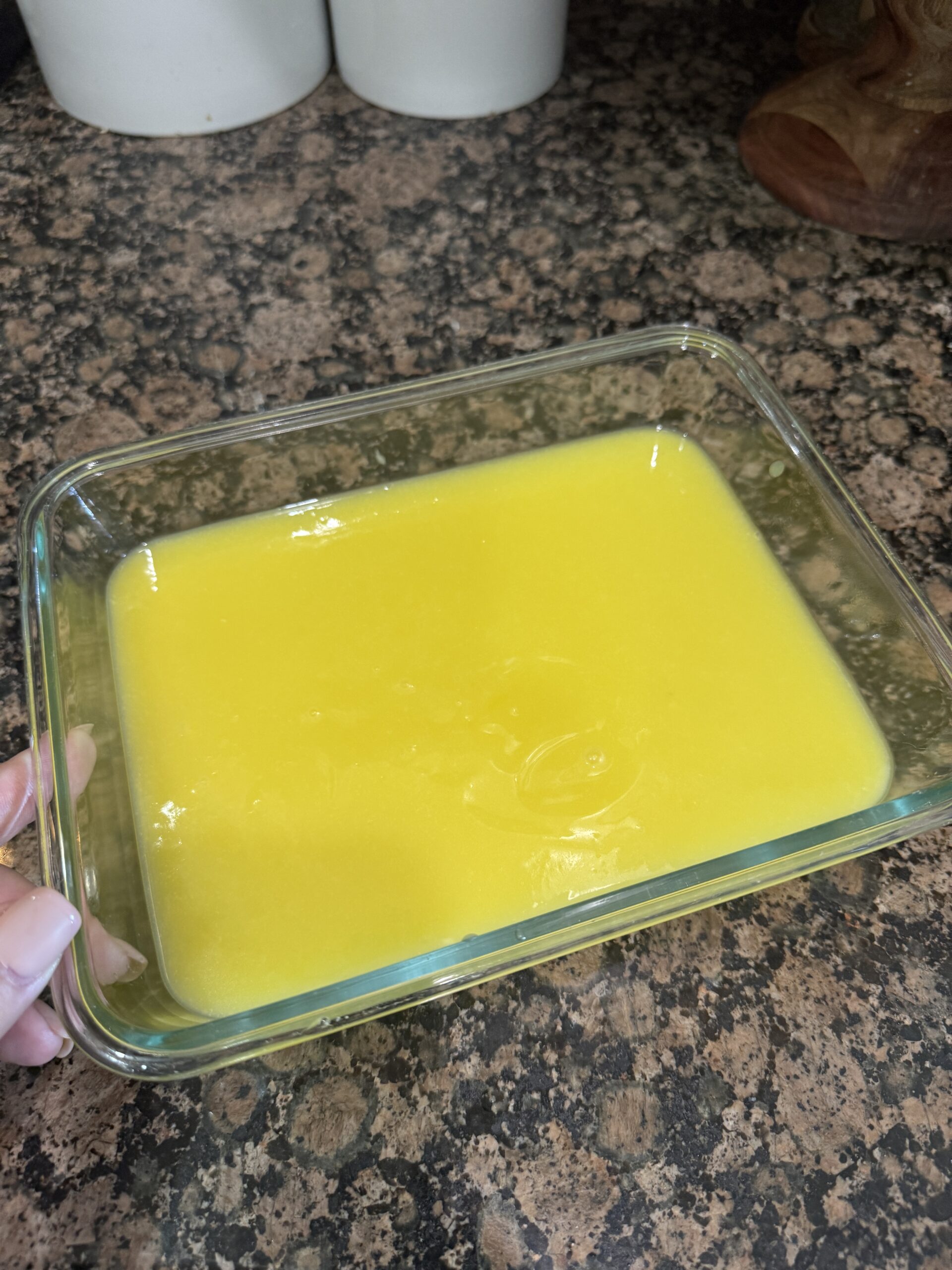 Lemon curd in square glass pyrex