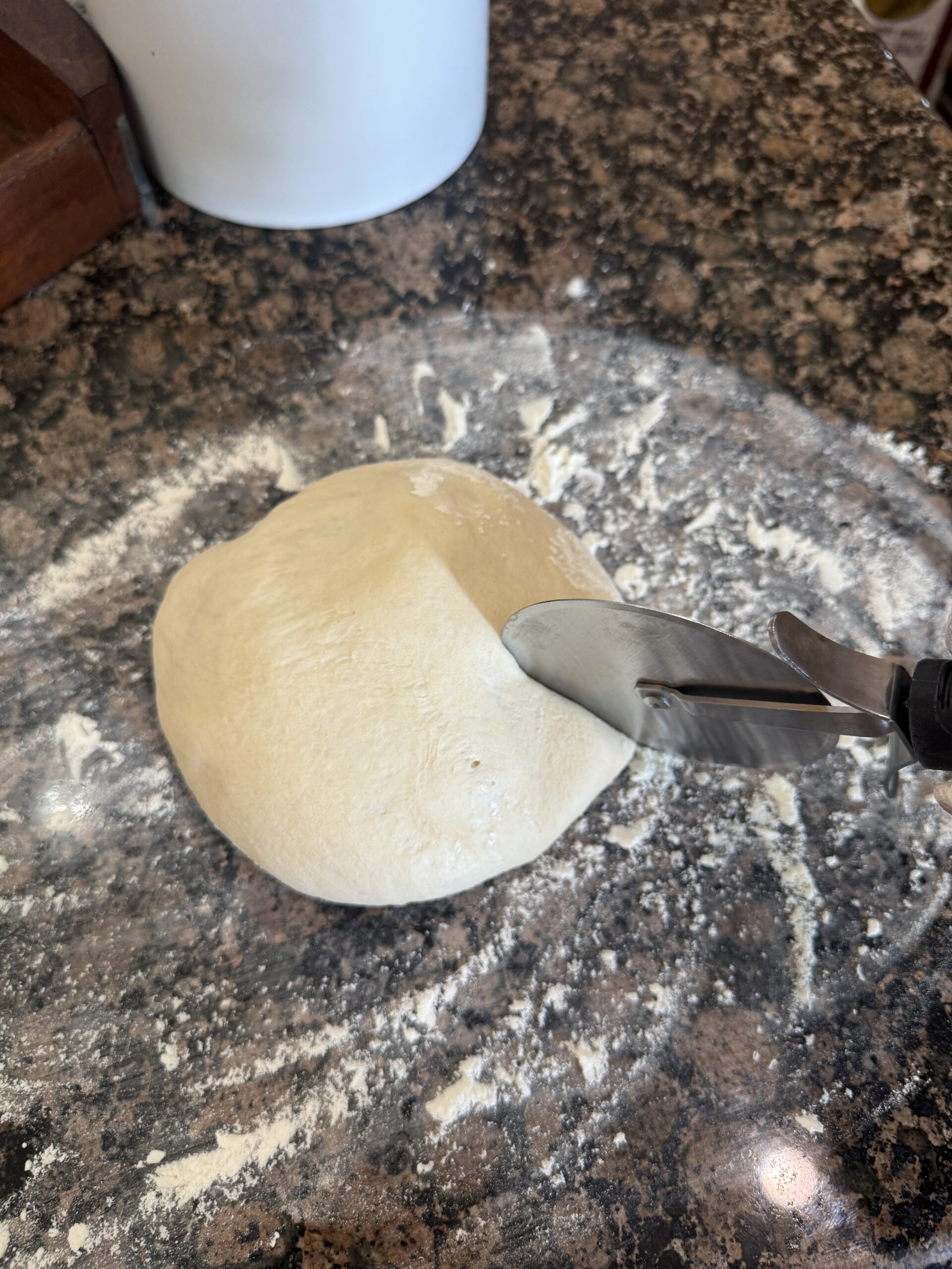 Dividing pizza dough