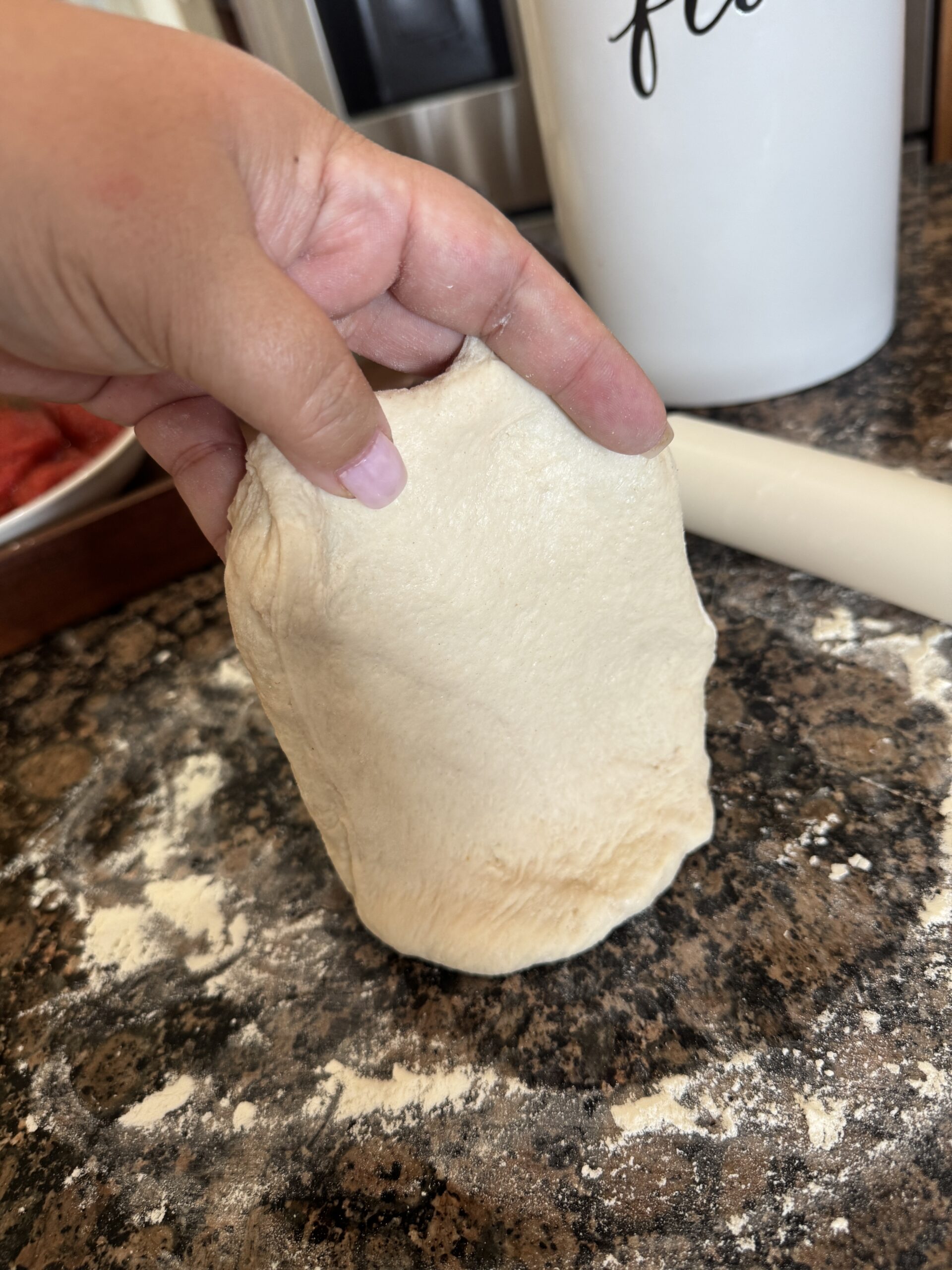 rolled out pizza dough