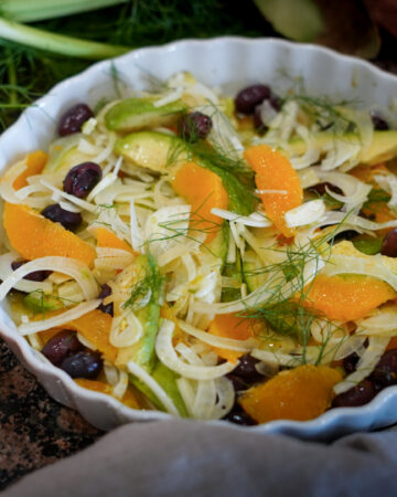 Fennel Orange Salad with Avocado on a plate.