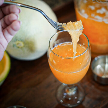 Ribbons of fresh cantaloupe in Filipino Cantaloupe Juice.
