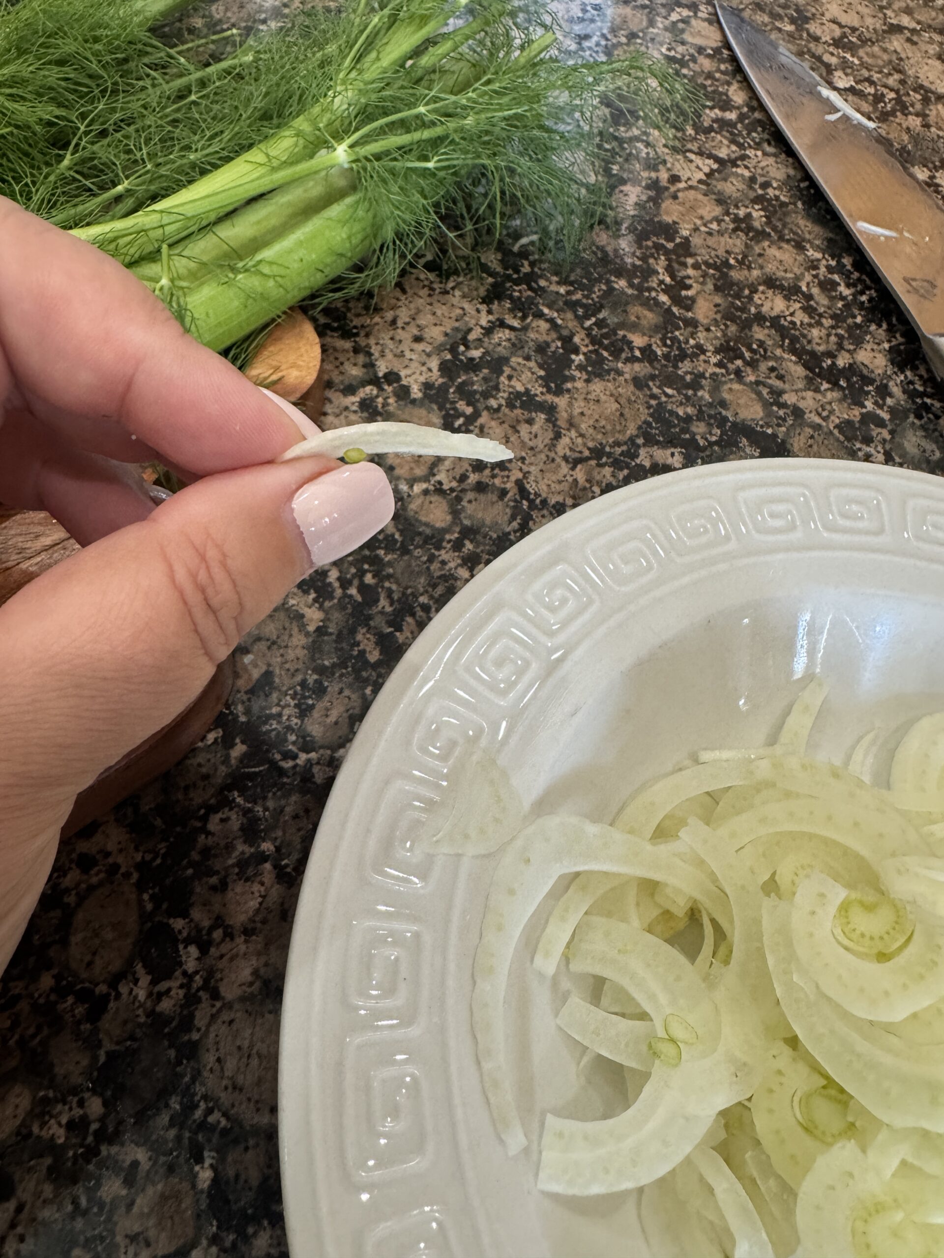 Thinly sliced fennel for fennel orange salad.
